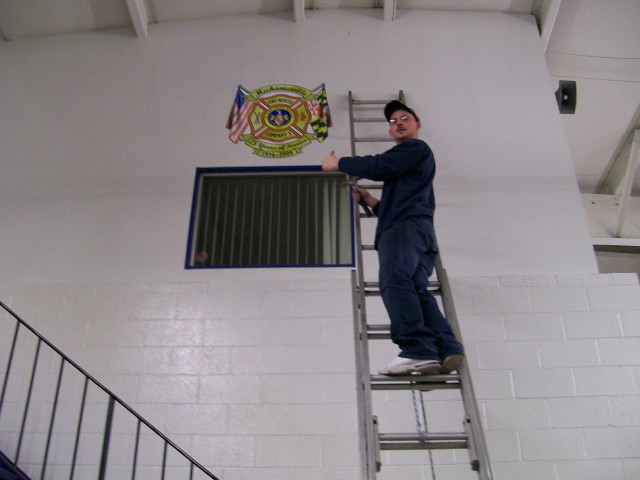 Robert Barnes gives a thumbs up in the hanging of our 75th patch.