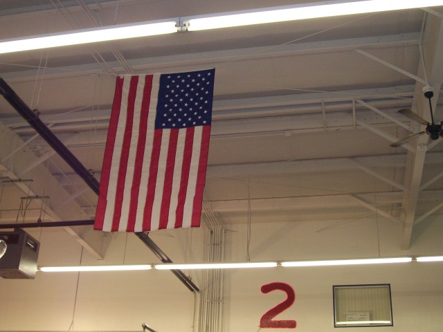 Old Glory flying over the apparatus of &quot;The Deuce&quot; 