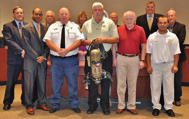 President Colonna, Assistant Chief Trowbridge, Member Joe Guyther, St.Mary's County Commisioners and Forrest Career and Technology Center personnel join in a photo following our donation of twenty-five Scott self-contained breathing apparatus to Forrest Center Vo-Tech students studying to become first responders.