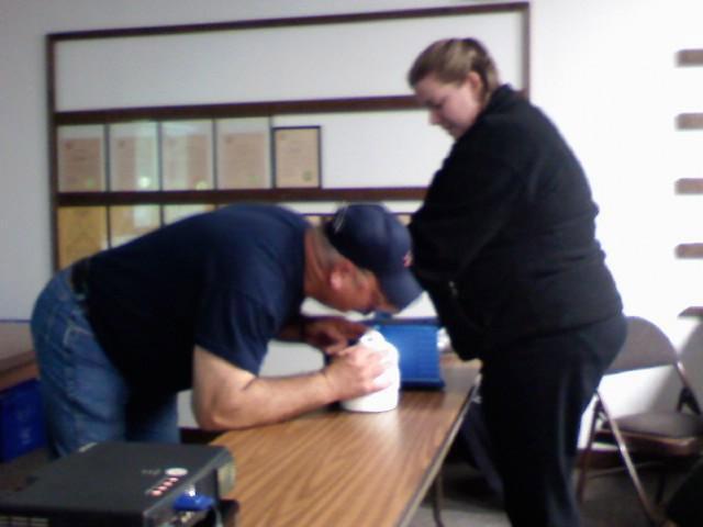 Papa Barns Refreshing His Memory in CPR. 