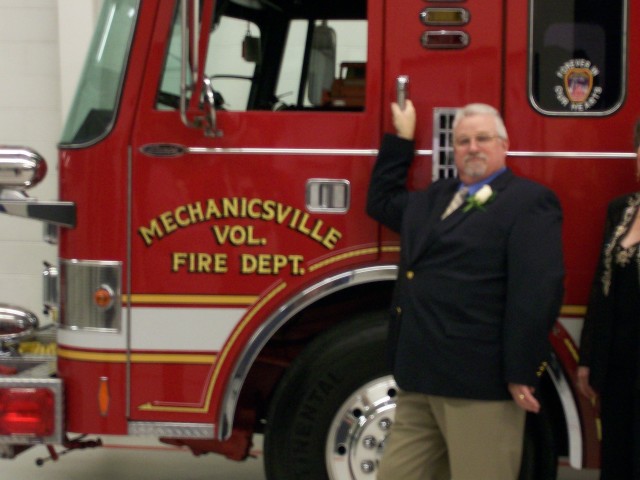 Station 22 Vice President Dave Sampson striking a pose 