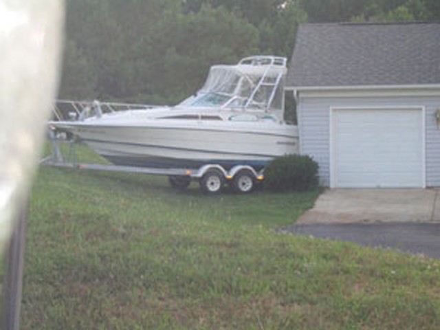 This boat broke free and drifted across the street eventually stopping when it hit this residence.