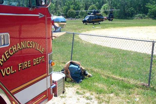 Engine 24 at an LZ in Country Lakes for Trooper 7