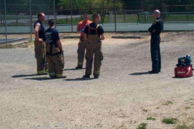 Engine 24's crew chats with the flight medic off of Trooper 7