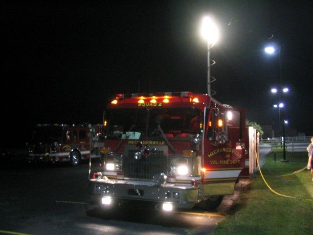 Rescue Squad 2 being utilized on drill night with Engine 224 in the shadow 