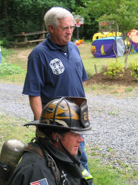 Firefighter Russell and Safety Officer Bellevou at a Fire Prevention Demo