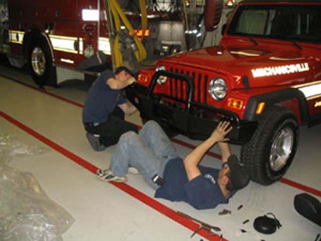 Scott and Todd engineering the bumper on Jeep-22.