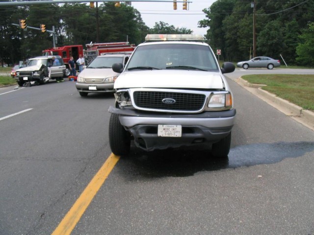 Medic 1 involved in a collision at Three Notch and New Market Roads, Engine 23 in the background