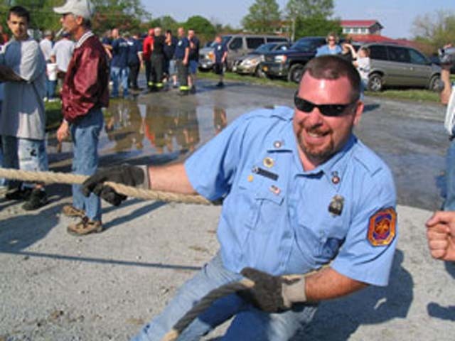 Mike Roache preparing for the Tug of War at the Southern Maryland Parade in Solomons.