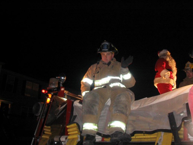 Ricky and Carlos with Santa on Engine 21