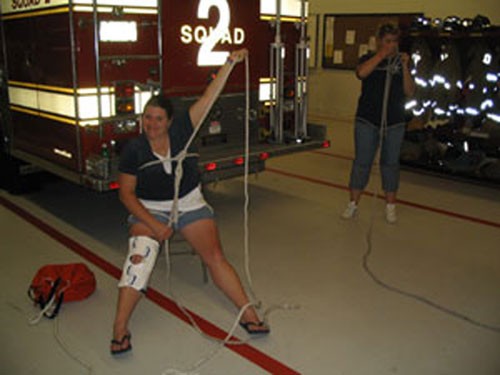 Brandi and Megan practice knots at drill.