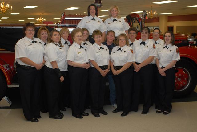 Ladies Auxiliary pose on Old Engine 1