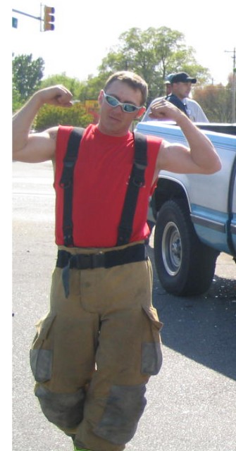 Firefighter Russell flexing for the camera!!! 