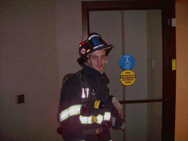 FF/EMT Mahaffey stops for a pose 