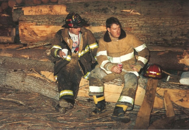 Mike and T-Bone take a breather during a lumber yard fire