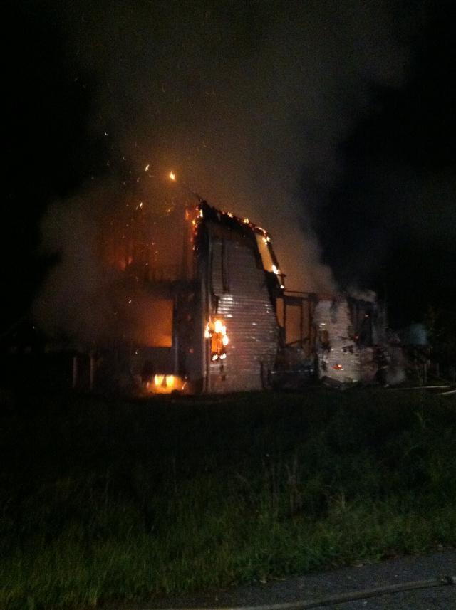 Firefighters battle an early morning house fire off of Bay Drive in Golden Beach 