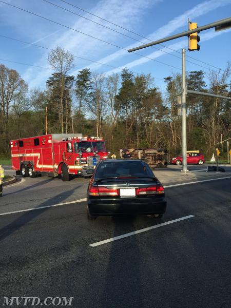 RES2CUE operates on a three vehicle accident, with one on its side.