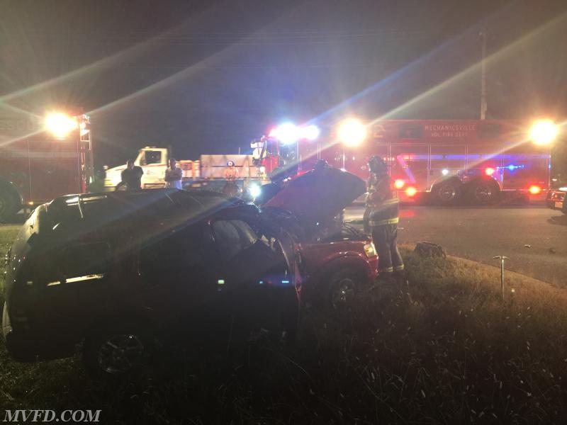 Firefighters operate on this two vehicle collision on Three Notch Road in Charlotte Hall.