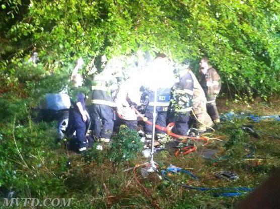 Crews working to extricate two trapped on Leonardtown Road in Hughesville.