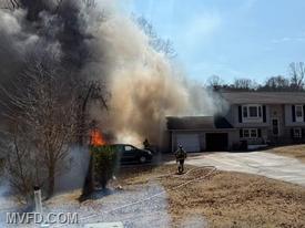 Crews arrived to find a detached structure well involved with fire, with extension to the woods and home. 